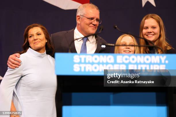 Prime Minister of Australia Scott Morrison, flanked by his wife Jenny Morrison and daughters Lily Morrison and Abbey Morrison concedes defeat...