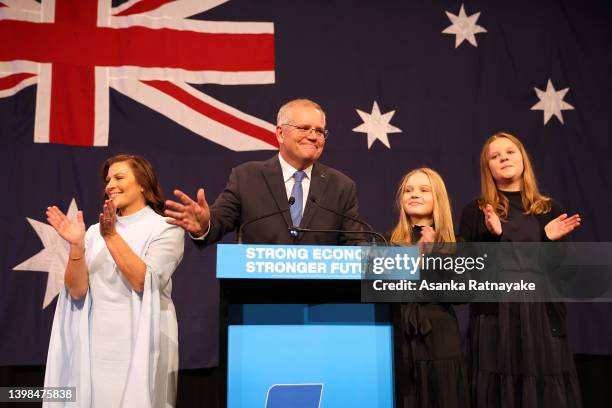 Prime Minister of Australia Scott Morrison, flanked by his wife Jenny Morrison and daughters Lily Morrison and Abbey Morrison concedes defeat...