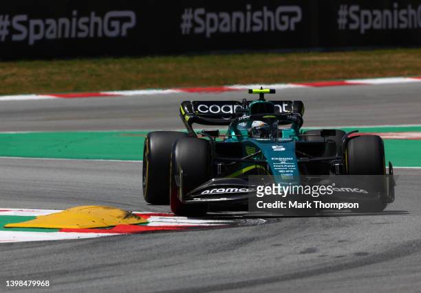 Sebastian Vettel of Germany driving the Aston Martin AMR22 Mercedes on track during practice ahead of the F1 Grand Prix of Spain at Circuit de...