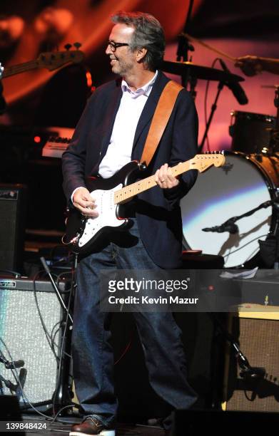 Eric Clapton performs on stage during Howlin For Hubert: A Concert to Benefit the Jazz Foundation of America at The Apollo Theater on February 24,...