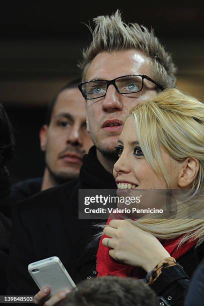 Maximiliano Gaston Lopez and wife Wanda Nara attend the Serie A match between AC Milan and Juventus FC at Stadio Giuseppe Meazza on February 25, 2012...