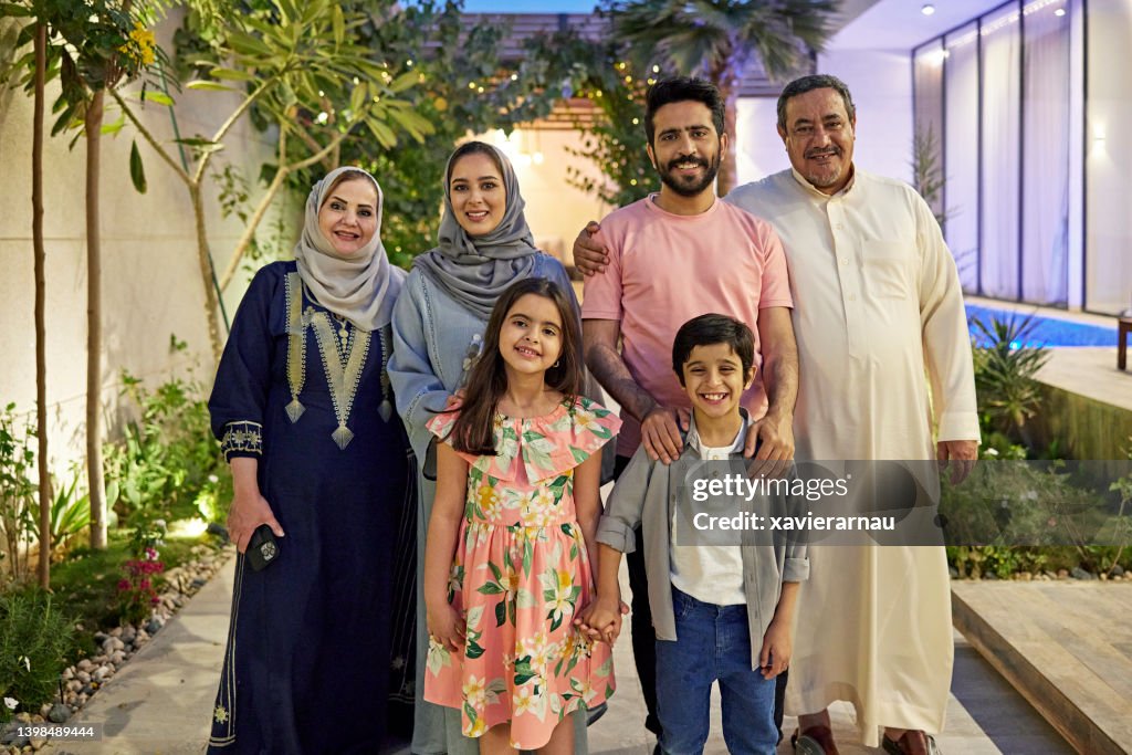 Portrait of three-generation Middle Eastern family in Riyadh