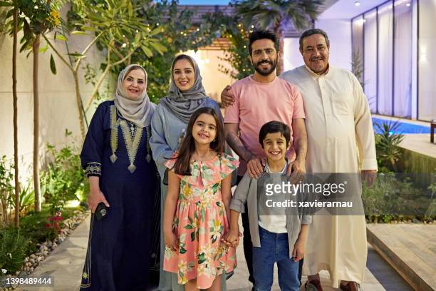 portrait of three-generation middle eastern family in riyadh - arabic family imagens e fotografias de stock