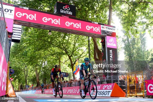 Richard Carapaz of Ecuador and Team INEOS Grenadiers and Jai Hindley of Australia and Team Bora - Hansgrohe cross the finish line during the 105th...