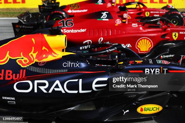 The car of Second placed qualifier Max Verstappen of the Netherlands and Oracle Red Bull Racing is pictured in parc ferme next to the cars of Pole...