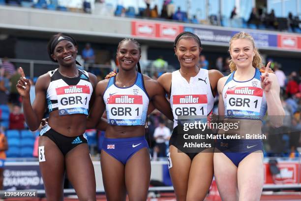 Daryll Neita, Dina Asher-Smith, Imani-Lara Lansiquot and Beth Dobbin of Great Britain celebrate following the Women's 4x100m Relay during Muller...