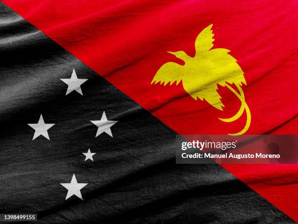 flag of papua new guinea - papua neuguinea stock pictures, royalty-free photos & images