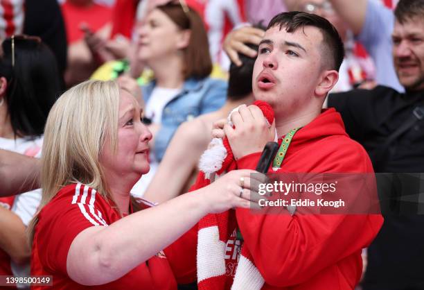 Sunderland fans celebrate during the Sky Bet League One Play-Off Final match between Sunderland and Wycombe Wanderers at Wembley Stadium on May 21,...