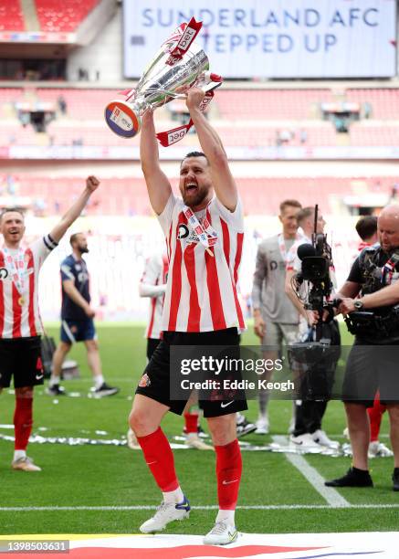 Bailey Wright of Sunderland celebrates with the Sky Bet League One Play-Off trophy following victory in the Sky Bet League One Play-Off Final match...