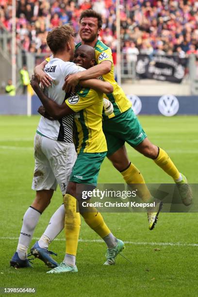 Julius Paris of Straelen and his team mates celebrate winning 1-0 the State Cup Final Lower Rhine between SV Straelen and Wuppertaler SV at...