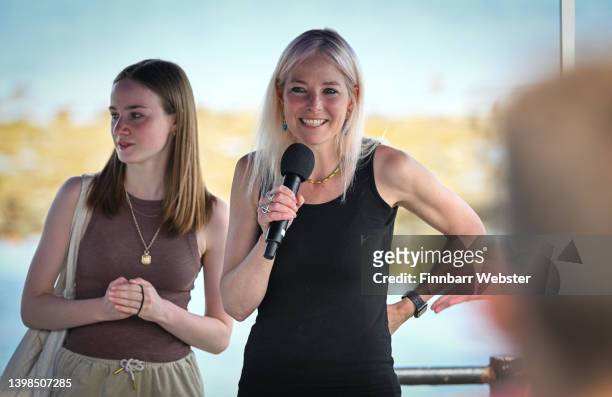 Professor Alice Roberts and Evie Swire address the crowd, on May 21, 2022 in Lyme Regis, England. The life-size bronze statue of fossil hunter Mary...