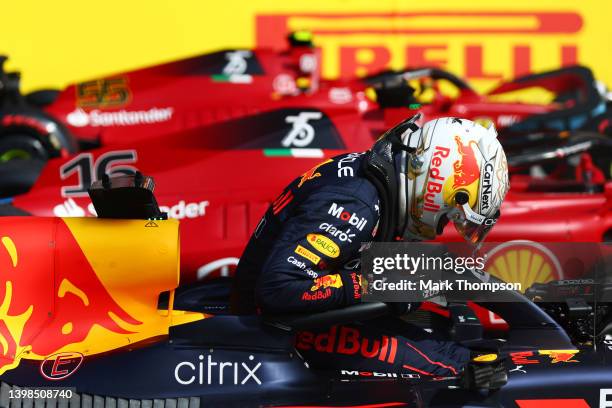 Second placed qualifier Max Verstappen of the Netherlands and Oracle Red Bull Racing climbs from his car in parc ferme during qualifying ahead of the...