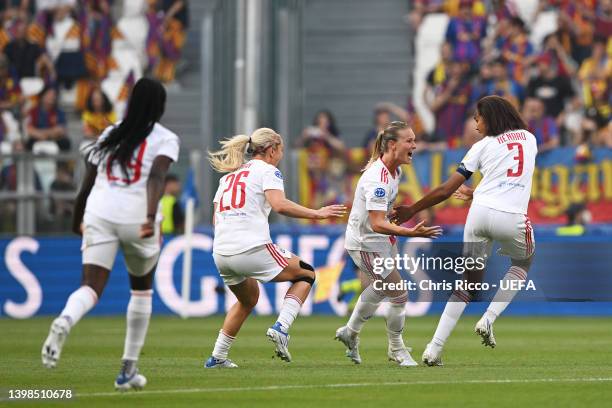Amandine Henry of Olympique Lyonnais celebrates with teammates after scoring their team's first goal during the UEFA Women's Champions League final...