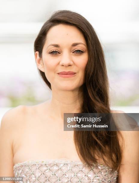 Marion Cotillard attends the photocall for "Brother And Sister " during the 75th annual Cannes film festival at Palais des Festivals on May 21, 2022...