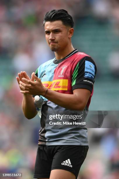 Marcus Smith of Harlequins applauds the fans at the end of the Gallagher Premiership Rugby match between Harlequins and Gloucester Rugby at...