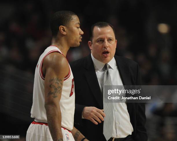 Head coach Tom Thibodeau of the Chicago Bulls gives instructions to Derrick Rose during a game against the Milwaukee Bucks at the United Center on...