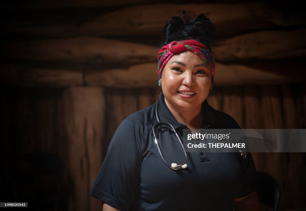 Youn female paramedic on