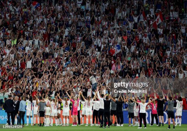 Olympique Lyonnais players celebrate with the fans following victory in the UEFA Women's Champions League final match between FC Barcelona and...