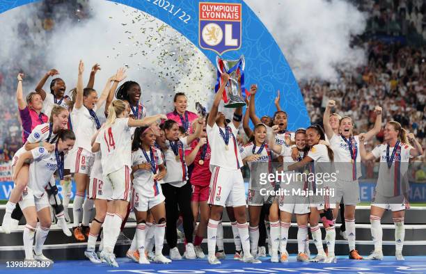 Wendie Renard of Olympique Lyonnais lifts the UEFA Women's Champions League following victory in the UEFA Women's Champions League final match...
