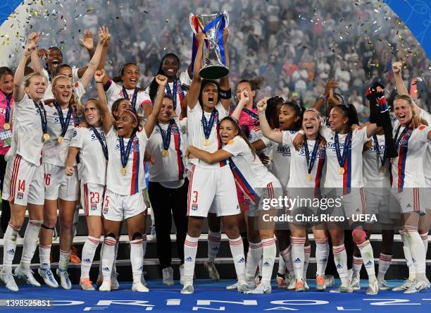 Wendie Renard of Olympique Lyonnais lifts the UEFA Women's Champions League trophy after their sides victory during the UEFA Women's Champions League...