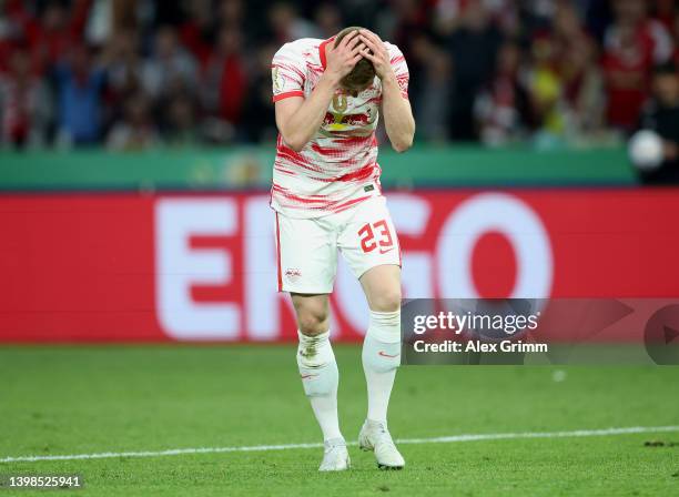 Marcel Halstenberg of RB Leipzig reacts after being shown a red card during the final match of the DFB Cup 2022 between SC Freiburg and RB Leipzig at...