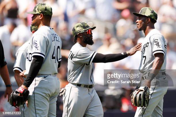 Josh Harrison holds back Tim Anderson of the Chicago White Sox after a benches-clearing dispute between Yasmani Grandal of the Chicago White Sox and...