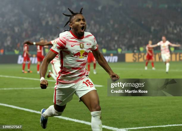 Christopher Nkunku of RB Leipzig celebrates after scoring their side's first goal during the final match of the DFB Cup 2022 between SC Freiburg and...