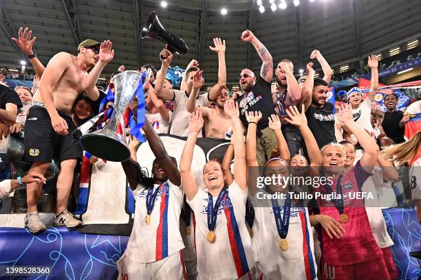 Griedge M'Bock Bathy of Olympique Lyonnais lifts the UEFA Women's Champions League trophy after their sides victory during the UEFA Women's Champions...