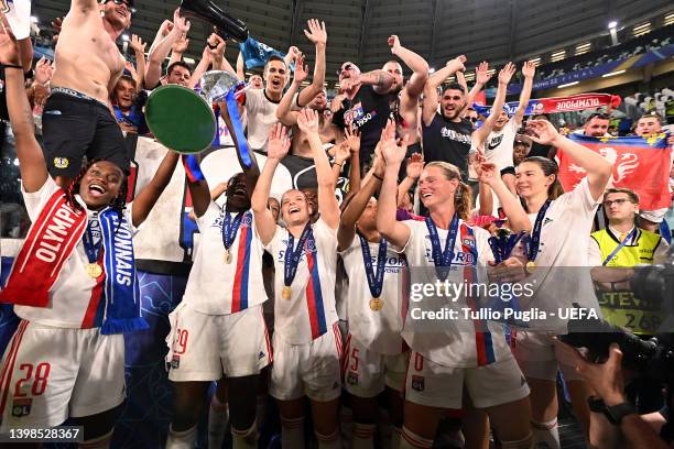 Griedge M'Bock Bathy of Olympique Lyonnais lifts the UEFA Women's Champions League trophy after their sides victory during the UEFA Women's Champions...