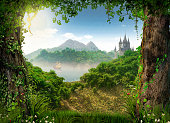 View through a beautiful enchanting fairy tale woodland onto a castle and a sailing ship