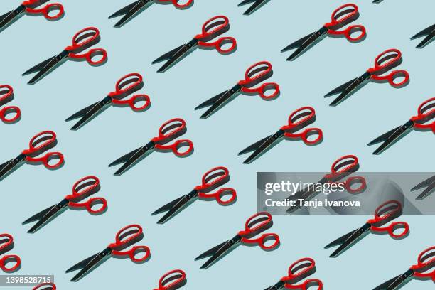 pattern of scissors on blue background - scissors stock pictures, royalty-free photos & images