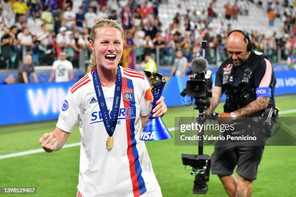 Ada Hegerberg of Olympique Lyonnais celebrates with the UEFA Women's Champions League trophy following victory in the UEFA Women's Champions League...