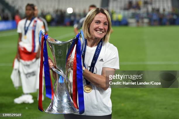 Sonia Bompastor, Head Coach of Olympique Lyon celebrates with the UEFA Women's Champions League Trophy following her team's victory in the UEFA...