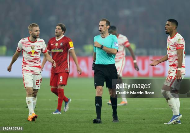 Referee, Sascha Stegemann looks on during the final match of the DFB Cup 2022 between SC Freiburg and RB Leipzig at Olympiastadion on May 21, 2022 in...