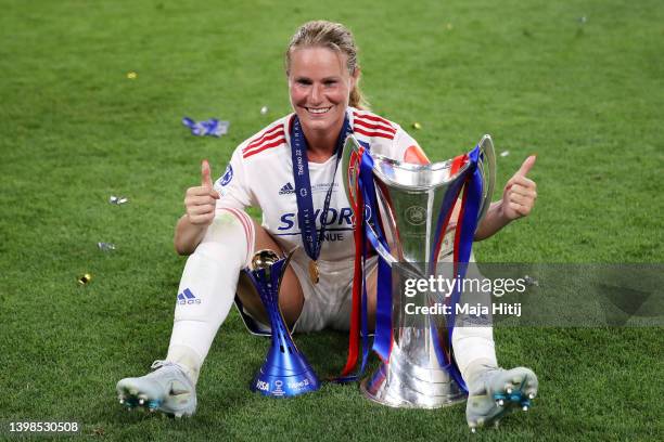 Amandine Henry of Olympique Lyonnais poses with the trophy and the player of the match award following victory in the UEFA Women's Champions League...