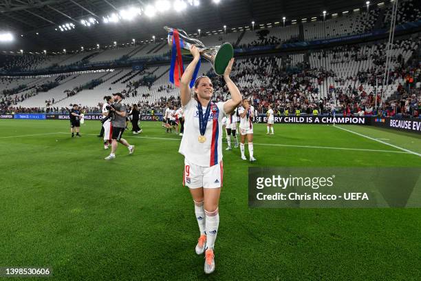 Eugenie Le Sommer of Olympique Lyonnais celebrates with the UEFA Women's Champions League trophy following victory in the UEFA Women's Champions...