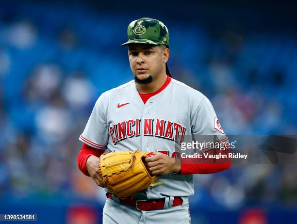 Luis Castillo of the Cincinnati Reds walks to the dugout during a MLB game against the Toronto Blue Jays at Rogers Centre on May 20, 2022 in Toronto,...