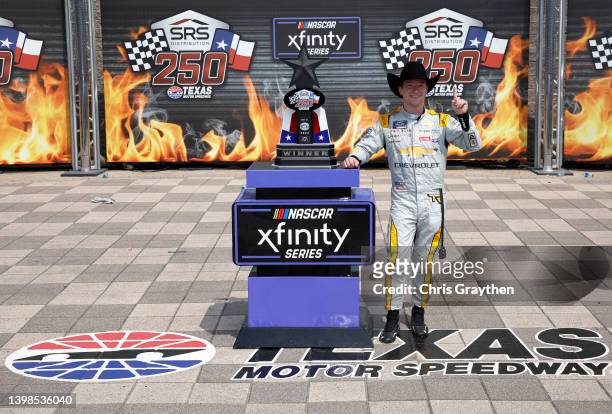 Tyler Reddick, driver of the Big Machine Racing/JAG Metals Chevrolet, and crew celebrate in victory lane after winning the NASCAR Xfinity Series SRS...