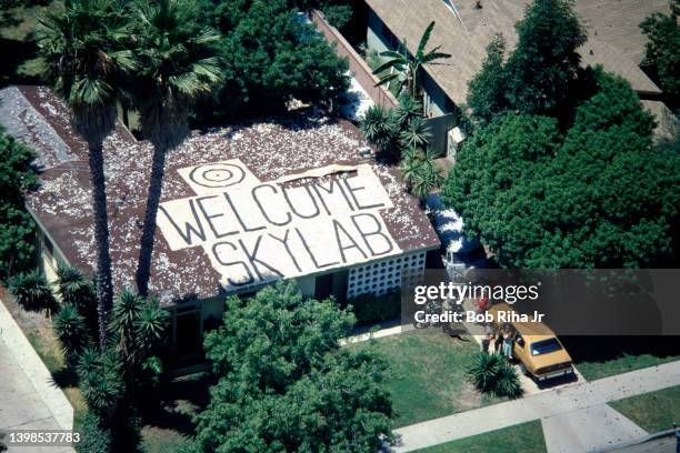 Homeowner Tom Swanner of Long Beach, California placed a large sign with a 'bulls-eye' to 'Welcome NASA Skylab', which is falling out of orbit in...