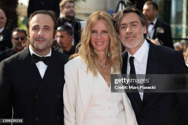 Emmanuel Mouret, Sandrine Kiberlain and Vincent Macaigne attend the screening of "Triangle Of Sadness" during the 75th annual Cannes film festival at...