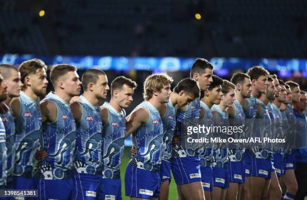 Kangaroos line up ahead of the round 10 AFL match between the North Melbourne Kangaroos and the Melbourne Demons at Marvel Stadium on May 21, 2022 in...