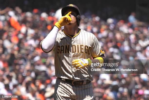 Manny Machado of the San Diego Padres celebrates after hitting a solo home run against the San Francisco Giants in the top of the third inning at...