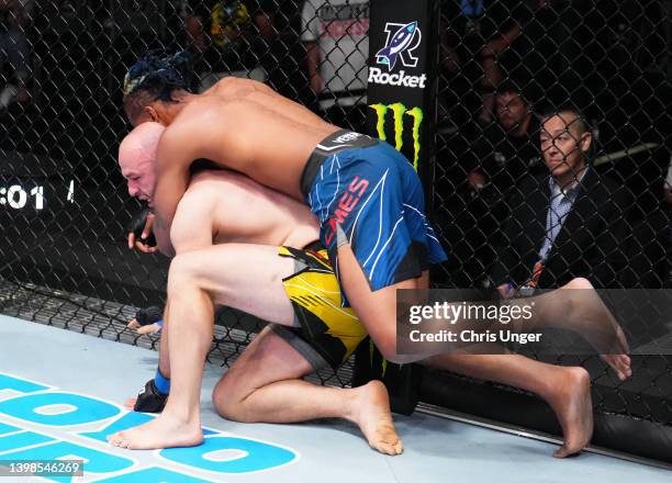 Joseph Holmes secures a rear choke submission against Alen Amedovski of Macedonia in a middleweight bout during the UFC Fight Night event at UFC APEX...