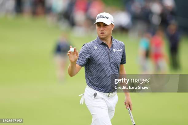 Justin Thomas of the United States reacts to his putt on the 14th green during the third round of the 2022 PGA Championship at Southern Hills Country...