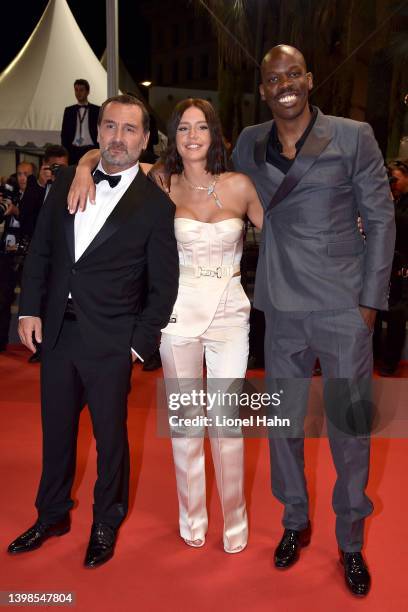 Gilles Lellouche, Adèle Exarchopoulos and Jean-Pascal Zadi attend the screening of "Smoking Causes Coughing " during the 75th annual Cannes film...