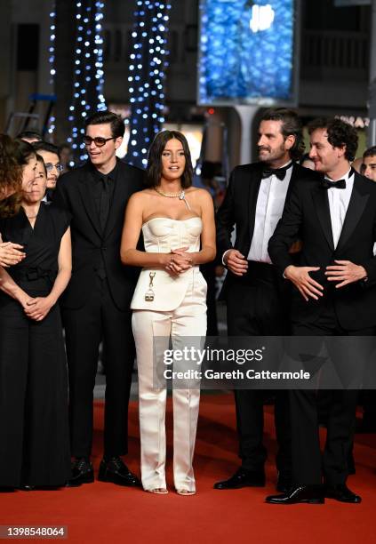 Raphael Quenard, Adèle Exarchopoulos, Gregoire Ludig and David Marsais attend the screening of "Smoking Causes Coughing " during the 75th annual...