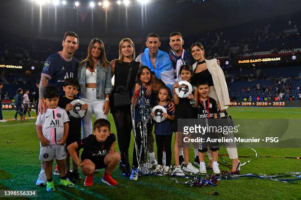 Leo Messi, Antonela Roccuzzo, Jorgelina Cardoso, Angel Di Maria, Leandro Paredes and Camila Galante and their kids pose after the trophy celebration...