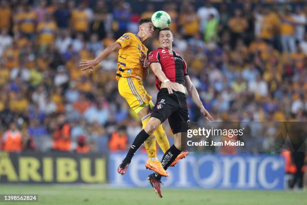 Igor Lichnovsky of Tigres fights for the ball with Julio Furch of Atlas during the semifinal second leg match between Tigres UANL and Atlas as part...