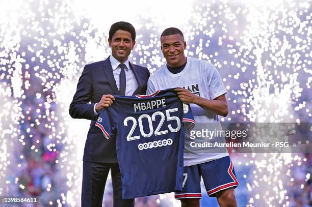 Kylian Mbappé poses with PSG President, Nasser Al-Khelaifi after extending his contract with the PSG prior to the Ligue 1 Uber Eats match between...