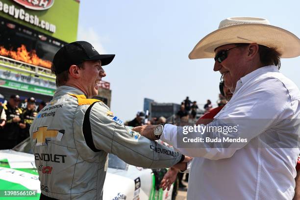 Tyler Reddick, driver of the Big Machine Racing/JAG Metals Chevrolet, is congratulated by RCR team owner Richard Childress in victory lane after...